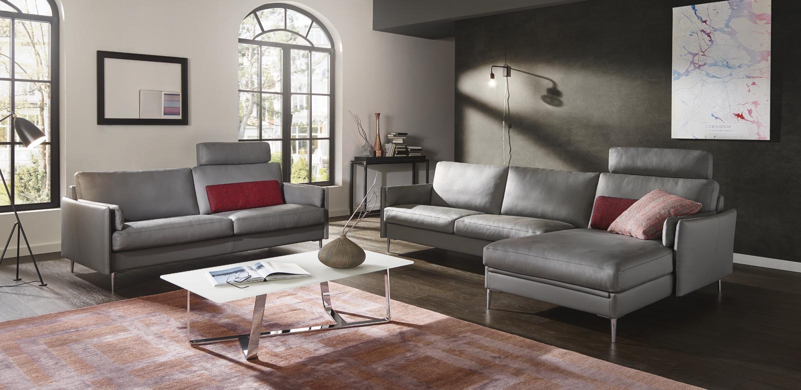 CL820 2-seater and longchair combination, with headrests, in grey leather and red cushions in a modern country house style