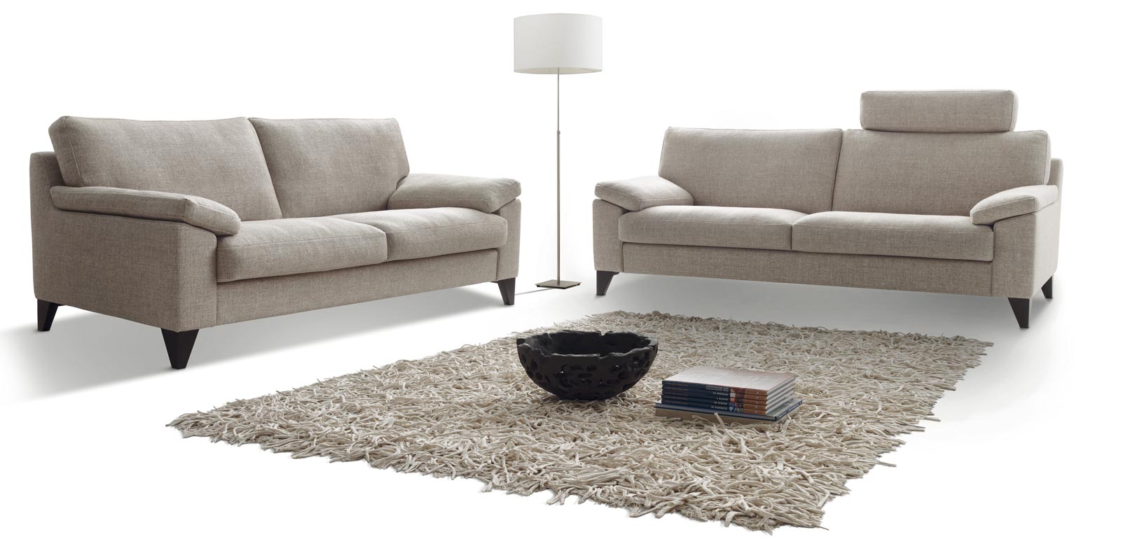 CL650 Sofas in beige and white fabric with headrest
