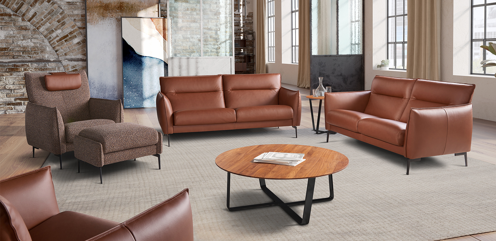 Ancona sofa in brown leather with Riva armchair in brown fabric.